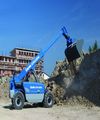 Телескопический погрузчик Genie GTH-2506 c установленным ковшом